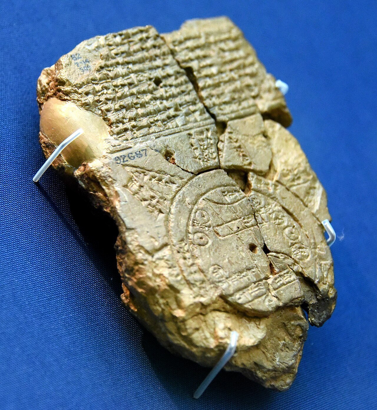 Babylonian clay tablet world map, a disk of land ringed by bitter water